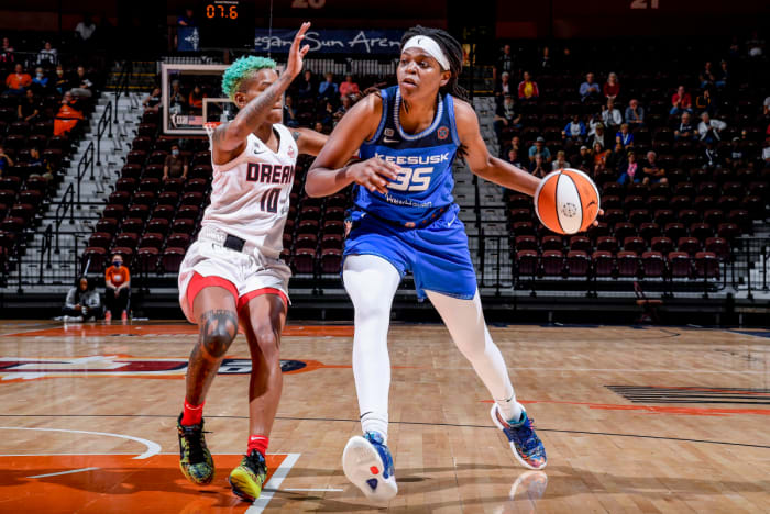 Jonquel Jones dribbles the basketball against the Atlanta Dream
